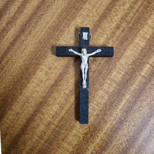 Dark wood and silver crucifix