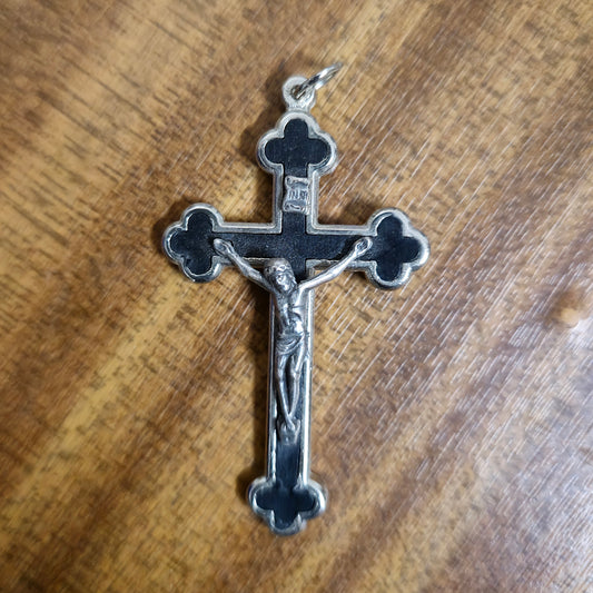 Small crucifix with attaching loop