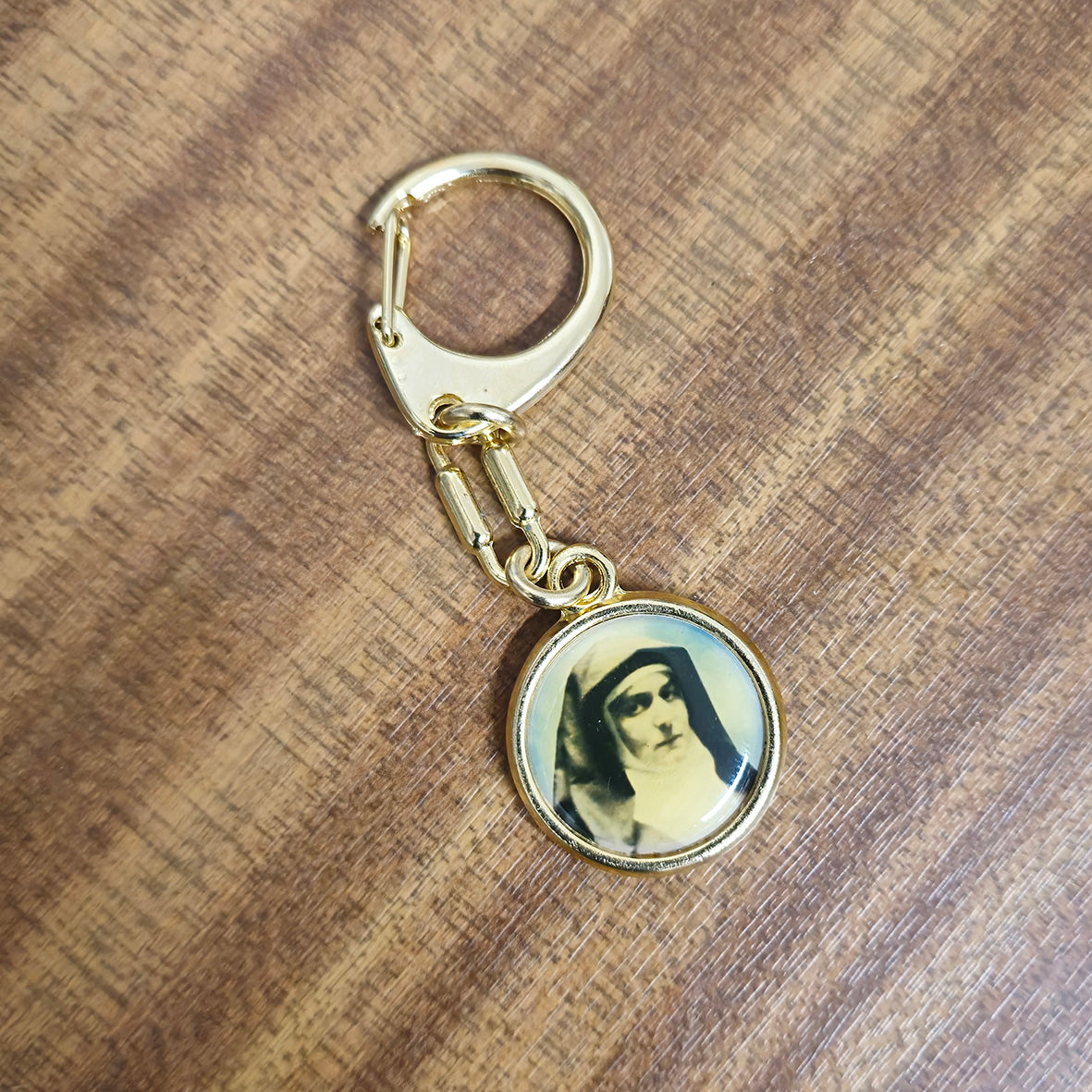 St Therese gold coloured medallion keyring